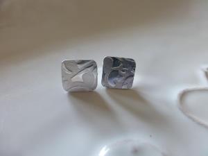 Square embossed studs 