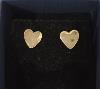 Small shiny heart studs